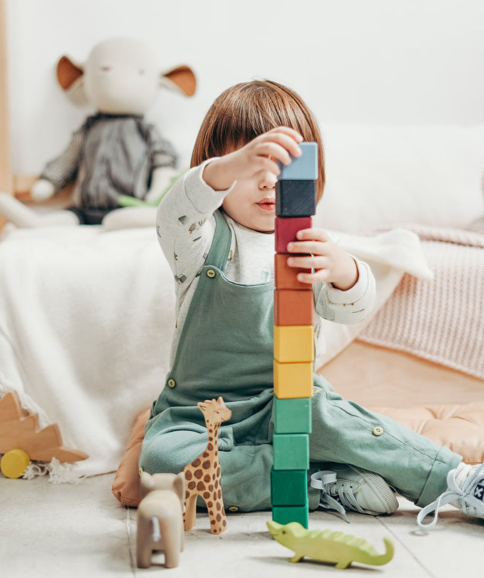 child with building blocks