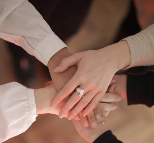 women's hands in unity